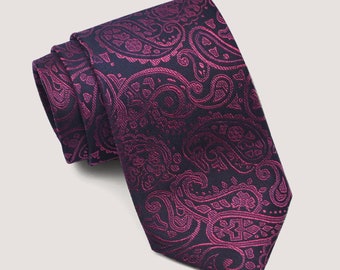 May include: A dark blue tie with a pink paisley pattern.