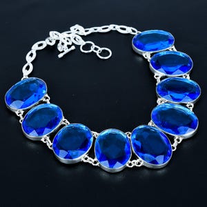 Faceted London Blue Topaz Necklace: Oval Gemstone, Sterling Silver