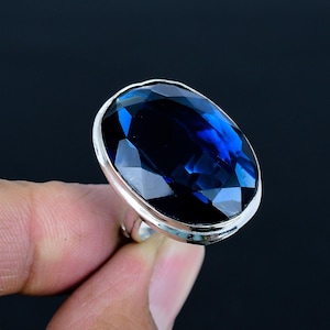 Faceted Iolite Ring: Adjustable Oval Gemstone, 925 Sterling Silver