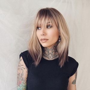 Laurel // Natural looking light blonde, brown straight short length bob wig with bangs