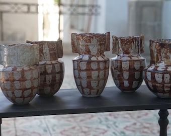The Keeper — a vessel and vase for memory, ceremony, and becoming