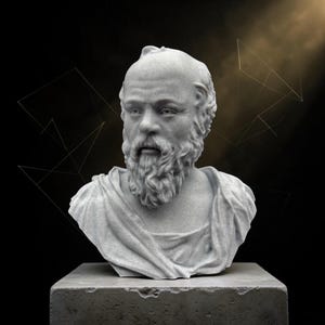 May include: A gray stone bust of a man with a full beard and a draped garment. The sculpture is mounted on a gray rectangular pedestal against a dark background with geometric shapes.