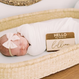 Engraved Hello Name Tag Sign by Heritage Sign Co. Makes for an adorable birth announcement or newborn photo prop. Available in multiple styles