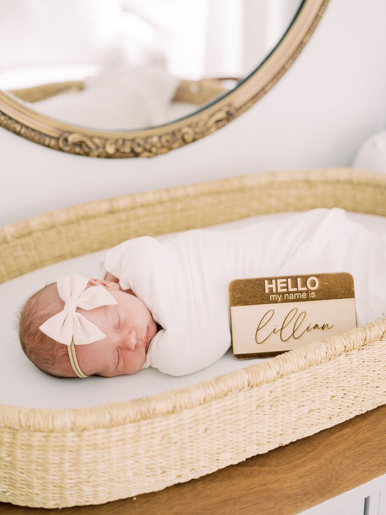 Engraved Hello Name Tag Sign by Heritage Sign Co. Makes for an adorable birth announcement or newborn photo prop. Available in multiple styles