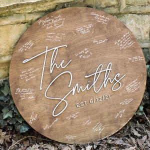 Wedding guestbook alternative custom wood sign personalized with last name and wedding date or wedding year for beautiful wedding keepsake.  Made by Heritage Sign Co and offered in multiple sizes and stain colors