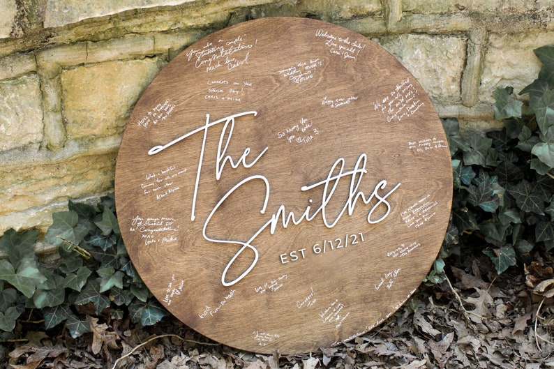 Wedding guestbook alternative custom wood sign personalized with last name and wedding date or wedding year for beautiful wedding keepsake.  Made by Heritage Sign Co and offered in multiple sizes and stain colors