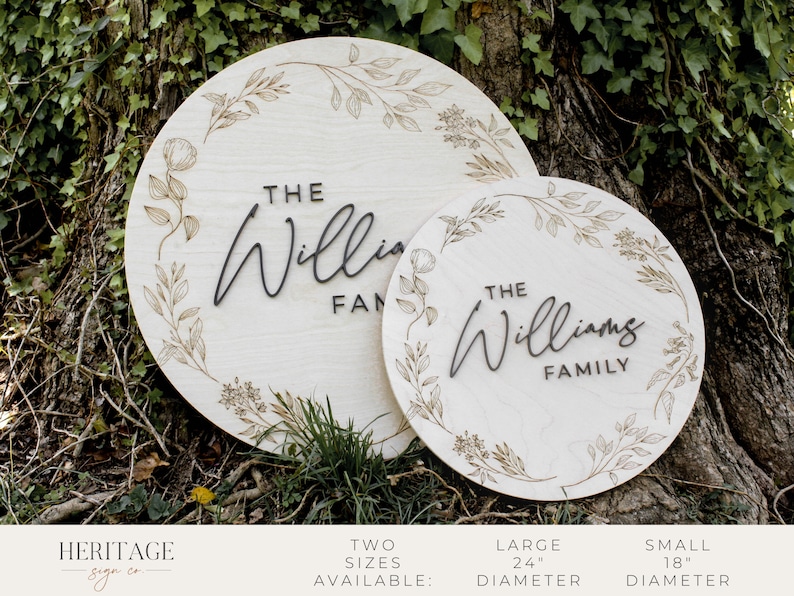 May include: Two round wooden signs with a floral design and the text "The Williams Family" and "The Williams Family". The signs are available in two sizes: 18 inches and 24 inches.