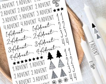 May include: A sheet of black and white stickers with various Christmas-themed designs. The stickers include numbers 1-4, the words "1. Advent" through "4. Advent", stars, snowflakes, Christmas trees, and ornaments.
