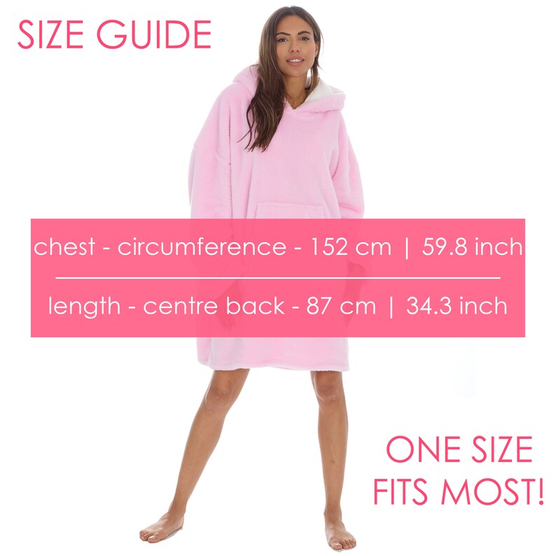 May include: A pink oversized hoodie with a hood and a kangaroo pocket. The size guide shows the chest circumference is 152 cm and the length is 87 cm. The text "ONE SIZE FITS MOST!" is displayed at the bottom of the image.