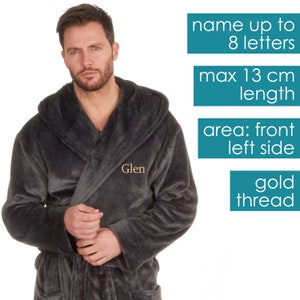 May include: A dark gray hooded robe with a gold thread embroidered name "Glen" on the front left side. The robe is made of soft, plush fabric. The image includes text indicating that the name can be personalized with up to 8 letters, the maximum length of the embroidery is 13 cm, and the embroidery area is on the front left side.