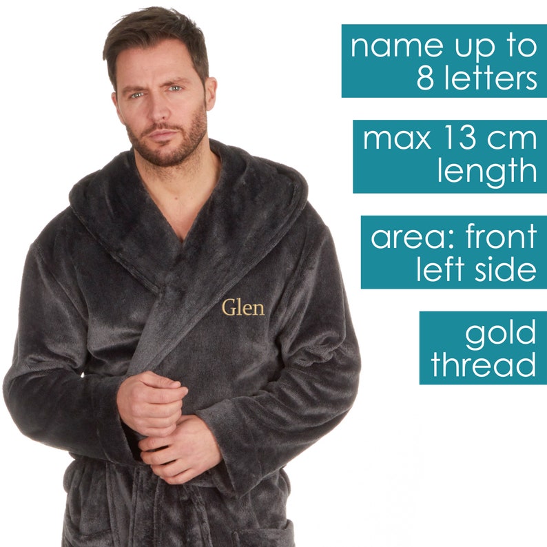 May include: A dark gray hooded robe with a gold thread embroidered name "Glen" on the front left side. The robe is made of soft, plush fabric. The image includes text indicating that the name can be personalized with up to 8 letters, the maximum length of the embroidery is 13 cm, and the embroidery area is on the front left side.