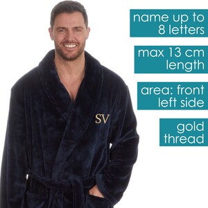 May include: A navy blue robe with a gold thread embroidered monogram on the left side. The monogram is "SV". The robe has a belt and a pocket on the left side. The text on the image reads "name up to 8 letters", "max 13 cm length", "area: front left side", and "gold thread".