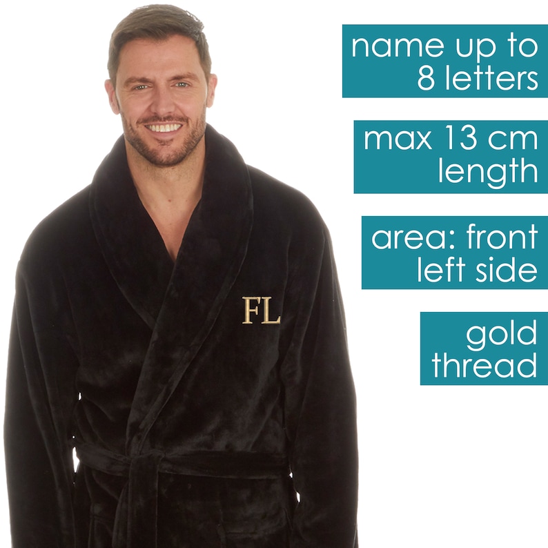 May include: Black plush robe with a gold embroidered monogram "FL" on the left side. The robe has a shawl collar and a tie belt. The text on the image reads "name up to 8 letters", "max 13 cm length", "area: front left side", and "gold thread".