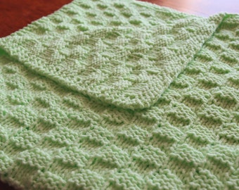 Hand-knitted baby blanket in a variety of colors