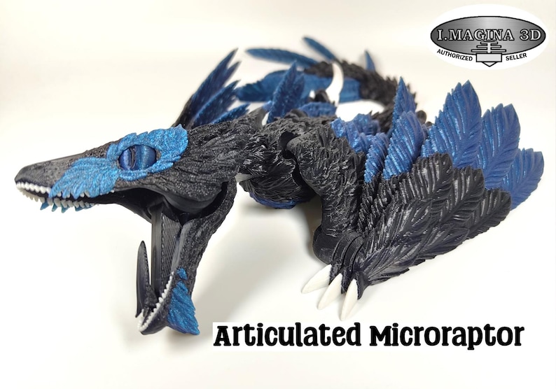 May include: Articulated Microraptor model in black and blue. The dinosaur has detailed feather-like structures and sharp white claws. The model's head features blue accents around the eyes and mouth. The model is a 3D printed item.