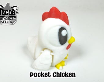 May include: A 3D-printed white chicken figurine with a red comb, black eyes, yellow beak and feet. The text "pocket chicken" is displayed below the figurine. The figurine is a novelty item.