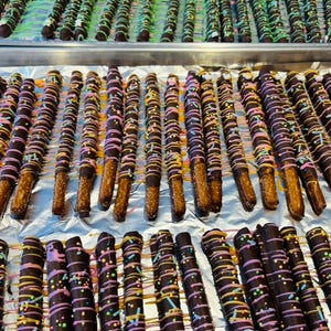 Chocolate covered Pretzel Rods-4 pack. Delicious gourmet chocolate.
