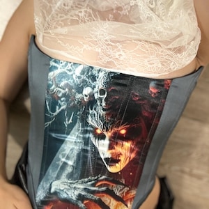 Corset costume accessories. Costume corset on party. the ghost of a girl drawing on a corset . Gothic corset