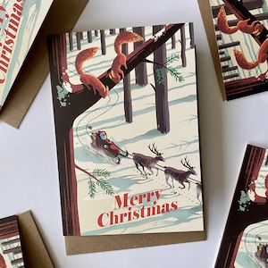 Set di 5 Carte di Natale con Babbo Natale in slitta trainata da renne e scoiattoli, Cinque Cartoline Buon Natale, Illustrazione invernale
