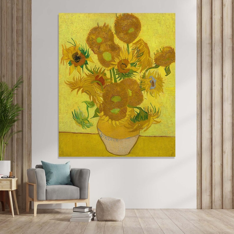 May include: A painting of a vase filled with sunflowers. The sunflowers are yellow and brown, and the vase is white with a yellow base. The background is a bright yellow.