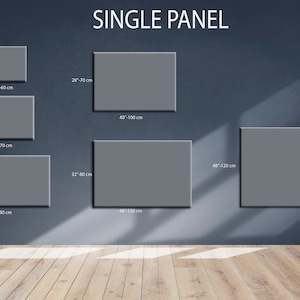 Puede incluir: Una pared que muestra diferentes tama&ntilde;os de impresiones en lienzo de un solo panel. Los tama&ntilde;os se indican en pulgadas y cent&iacute;metros. La pared es de color gris oscuro.