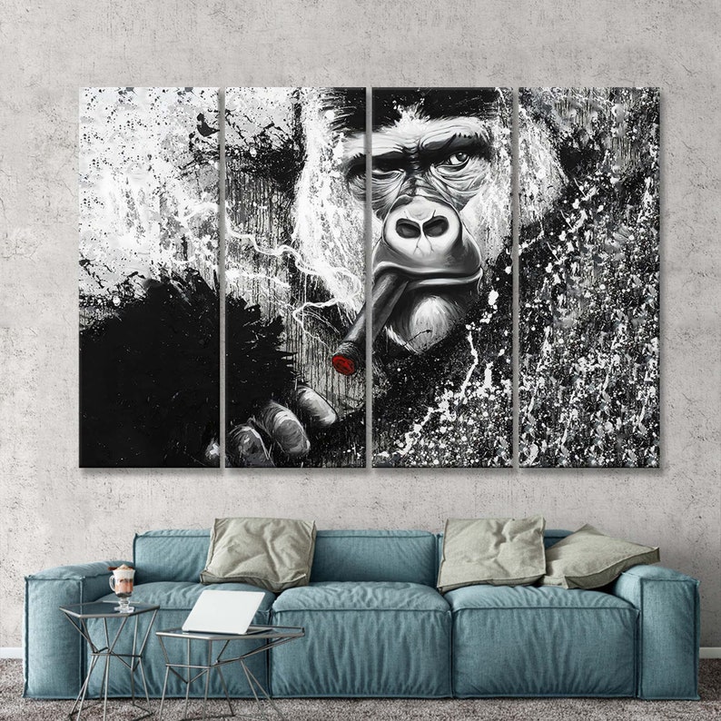 May include: A black and white multi-panel canvas print featuring a close-up of a gorilla's face with a lit cigar in its mouth. The background is a textured black and white abstract design.