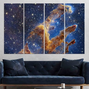 May include: A multi-panel canvas print featuring a vibrant nebula with swirling orange and yellow gas clouds against a deep blue starry background.