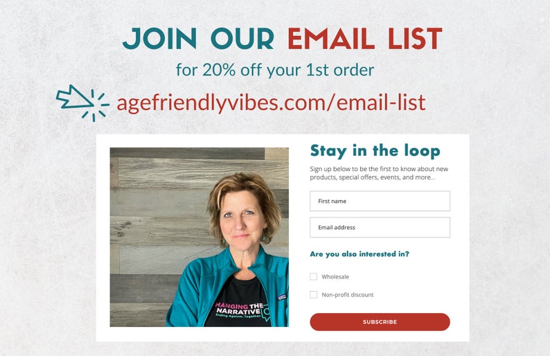 May include: A woman smiles at the camera while wearing a teal blue sweatshirt with the text "Hanging the Narrative" in white. The image is a screenshot of a website with a form to join an email list for 20% off the first order. The form asks for the user's first name and email address and offers the option to receive information about wholesale and non-profit discounts.