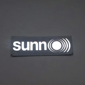 Sunn silver logo.