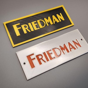 FRIEDMAN gold and black logo 150mm=5.9"
