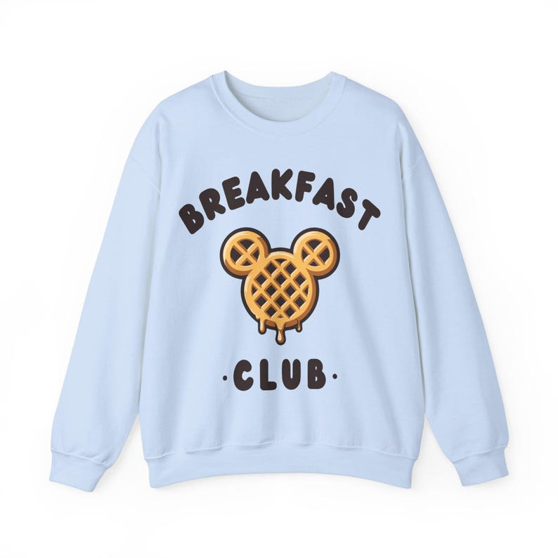 May include: Light blue sweatshirt with a waffle Mickey Mouse design and the text "Breakfast Club".