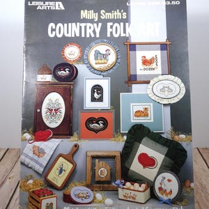 Country - Milly Smith's Country Folk Art, Ulotka 286 Leisure Arts Counted Cross Stitch