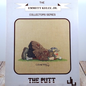 Emmett Kelly, Jr., seria kolekcjonerska „The Putt” EKJ11 – wzory Judith Lynn Ulotka ze wzorem do haftu krzyżykowego