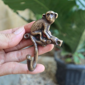 4 crochets vintage singe en laiton massif - Crochets antiques pour serviette/manteau