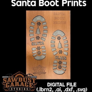 May include: Wooden Santa Boot Prints design with the text "Santa Boot Prints". The design includes two boot prints with the words "Santa" and "Claus", snowflakes, and a Christmas tree. The Sawdust Garage Studios logo is at the bottom.