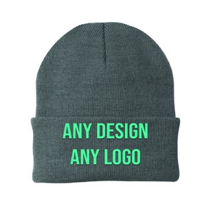 May include: Grey knitted beanie with the text "ANY DESIGN ANY LOGO" in green.