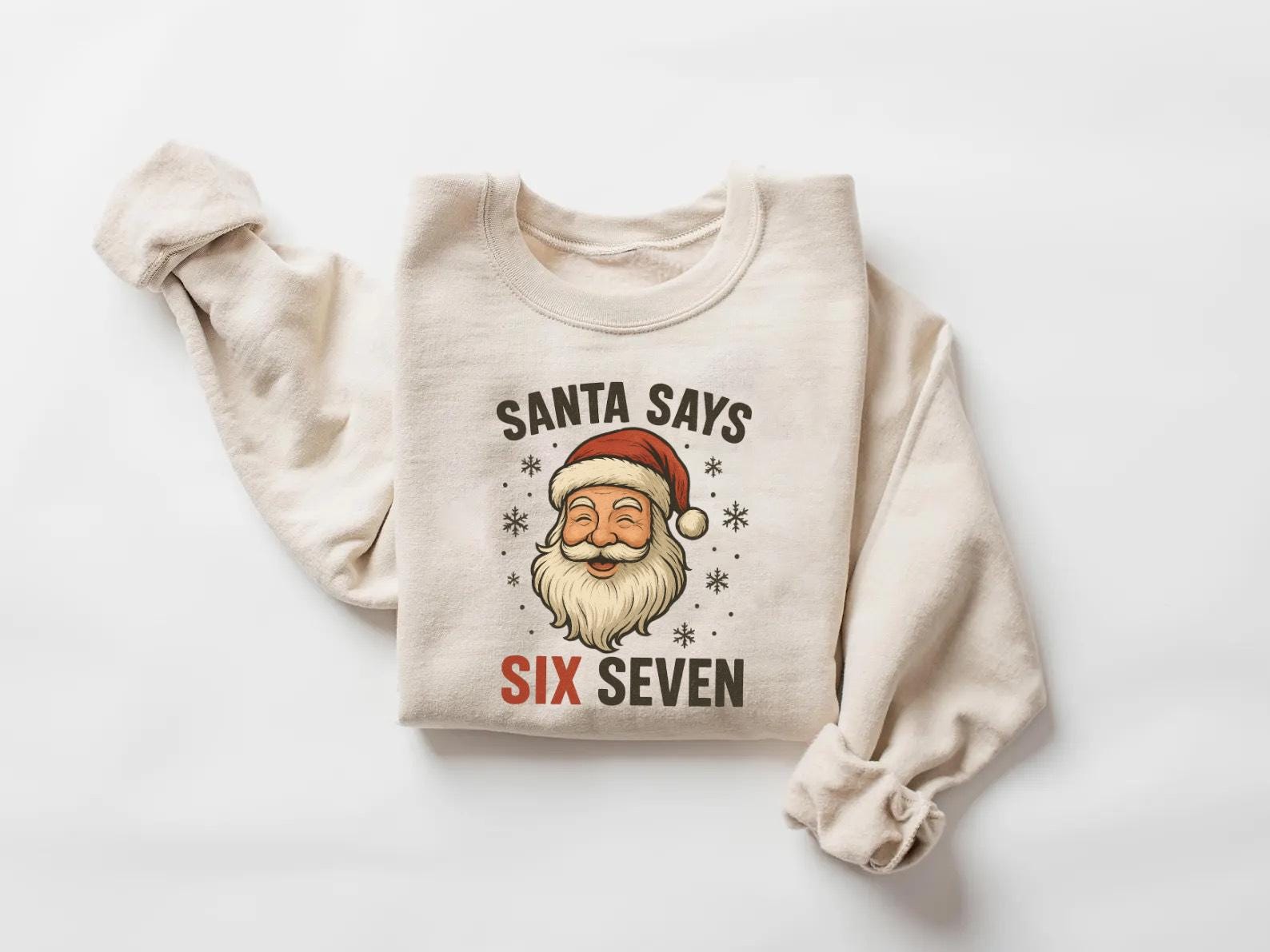 サンタさんが67と言っているTシャツのデザイン、面白いクリスマス