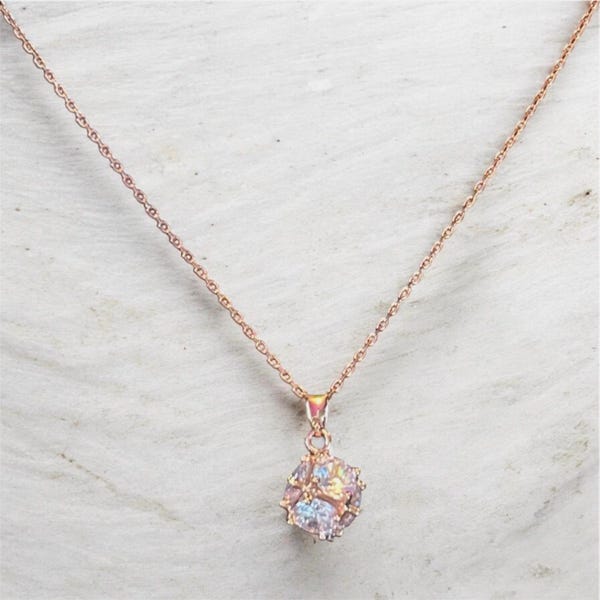 rose gold necklace with iridescent crystal cube pendant