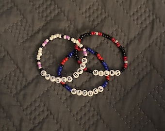 Across The Spiderverse Bracelets. Spider Gwen, Miles Morales and Miguel O’Hara inspired seed bead friendship bracelets
