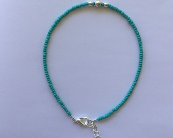 Aqua beaded anklet with silver bead feature and 3cm extender chain