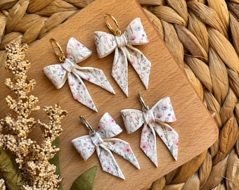 White Ditsy Florals Bow Huggies
