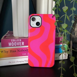 PINK SWIRLS CASE - Tough phone case with bright pink and red swirls and shiny exterior for iPhone and Samsung. Made in the u.k.