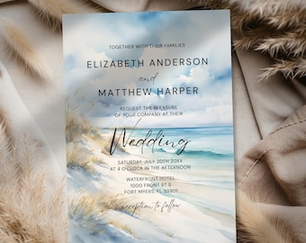 May include: Wedding invitation with a watercolor beach scene. The invitation features the names Elizabeth Anderson and Matthew Harper, with the word "Wedding" in elegant script. The date and time are included, along with the location: Waterfront Hotel, Fort Myers, FL.