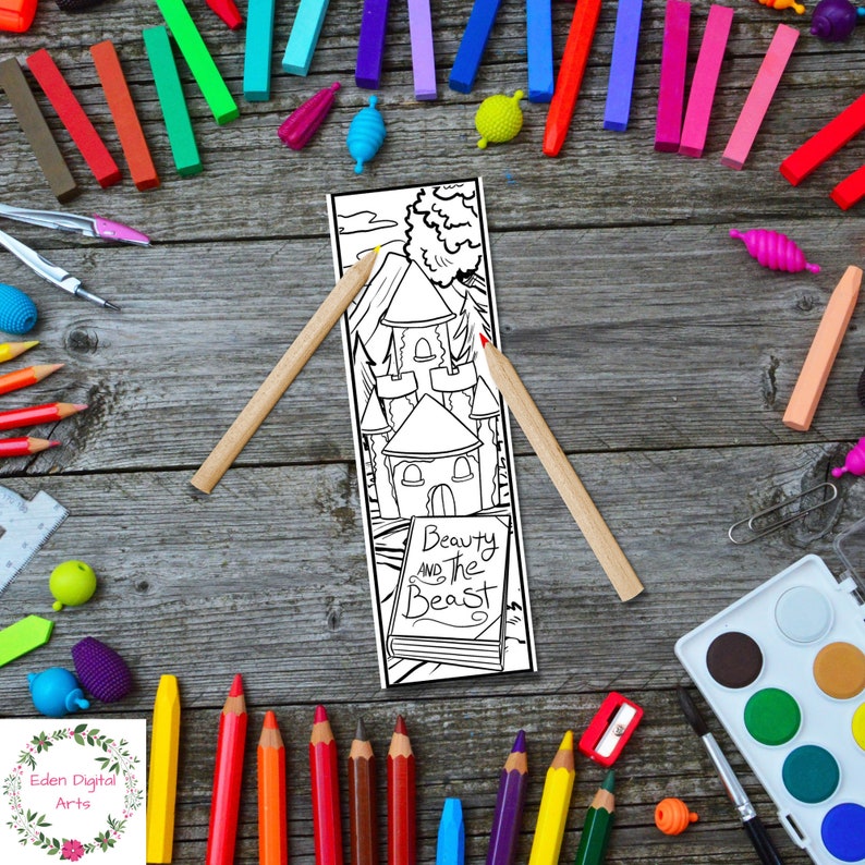 May include: A black and white printable bookmark featuring a castle and the text "Beauty and the Beast". The bookmark is surrounded by colourful art supplies, including crayons, pencils and paint.