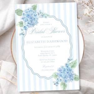May include: A light blue and white striped bridal shower invitation. The invitation features a floral design with blue hydrangeas and the text "Bridal Shower" in elegant script. Details include the honoree's name, date, time, and RSVP information.