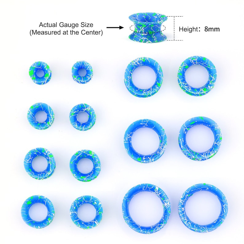 May include: Set of 10 blue and green acrylic ear gauges with white speckles. The gauges are in various sizes and are 8 mm in height. Actual gauge size is measured at the center.