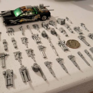 New Tiny Weapons Pack 40 items Silver 3d printed. 19 to 22 mm long width varies, 1/64 scale realistic size.