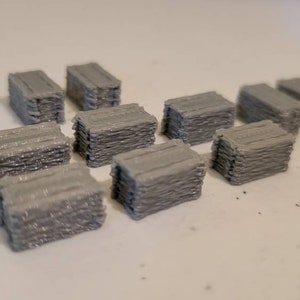 Hay Bales for decor 1/64 scale. Silver 3d printed. 10 items all together. Can paint to desired color.