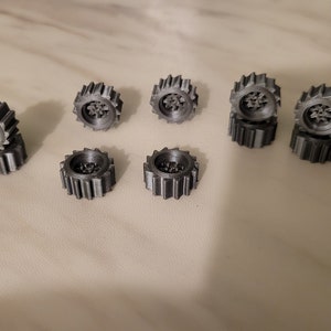 BIG GRIPPIN TIRES hole in the center 1/64 scale 3D printed. 12 items  Tire Size is 16 mm