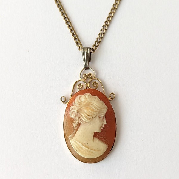 Vintage cameo necklace. Oval cameo pendant. Bust of woman. Gold tone frame, dainty chain. Small cameo necklace